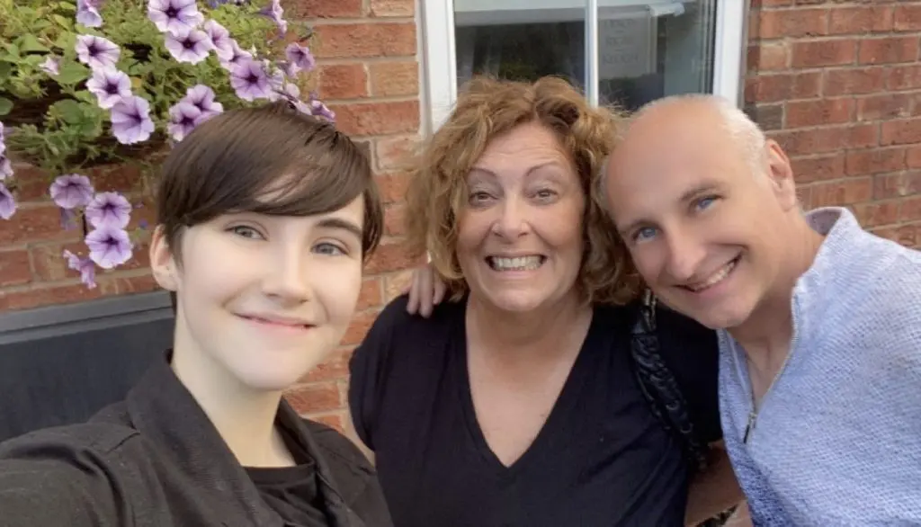 Evie and her proud parents